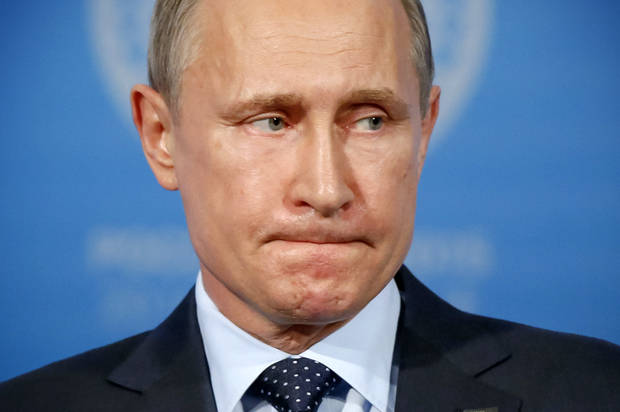 Russia’s President Vladimir Putin looks on at a news conference after the Shanghai Cooperation Organization (SCO) summit in Ufa, Russia